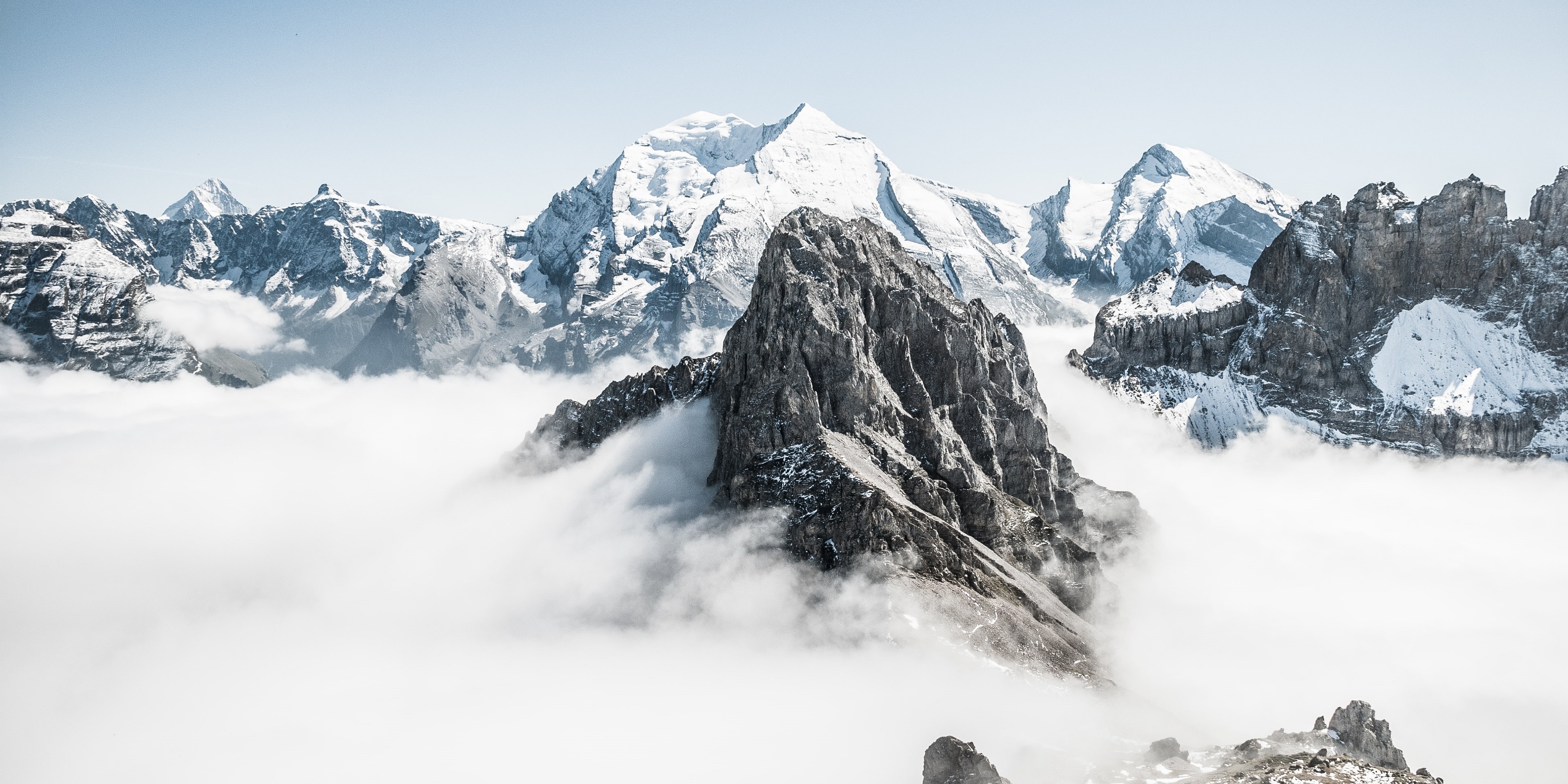 Mountain peaks above fog