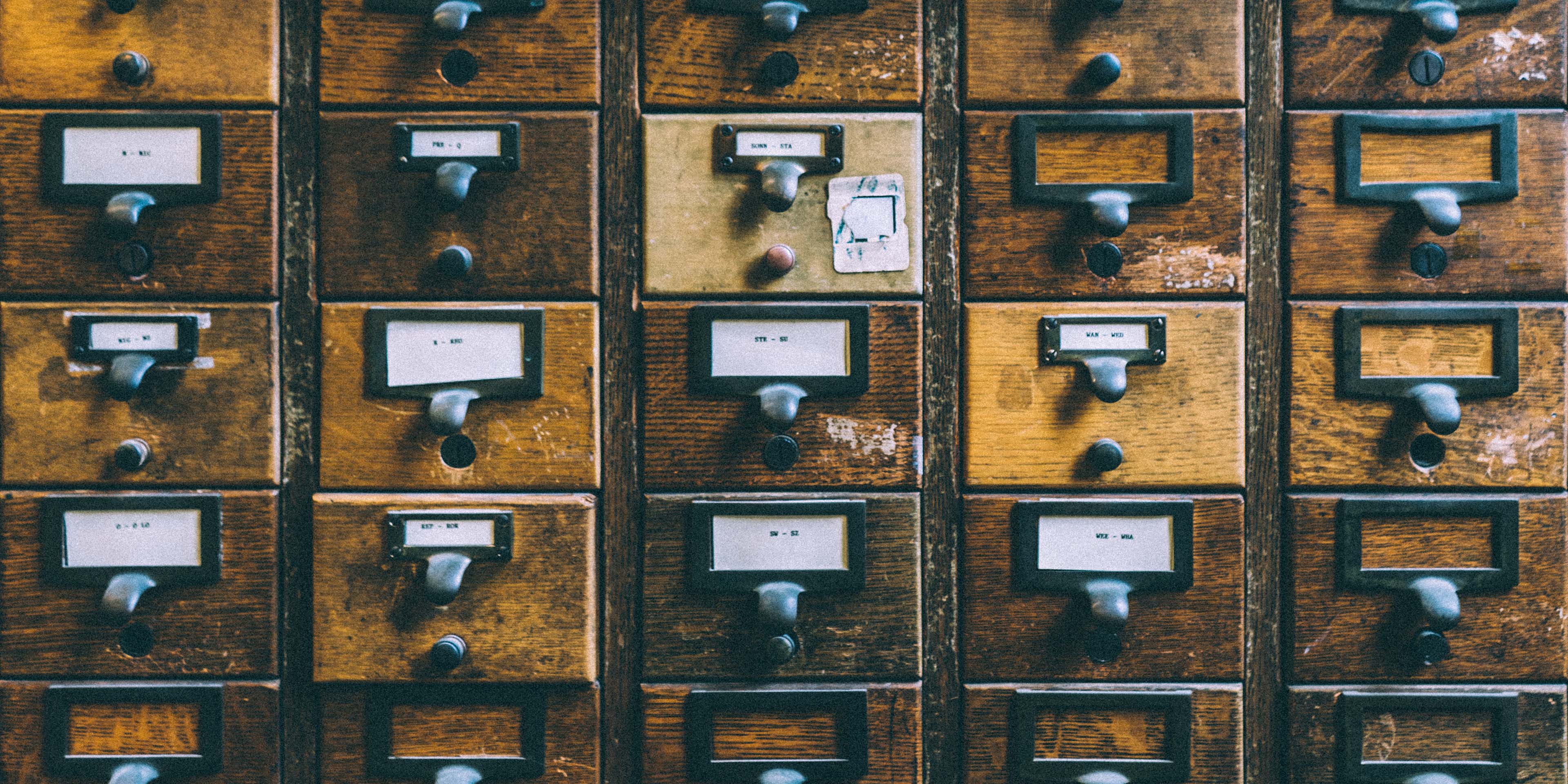 Old library card catalog file drawers